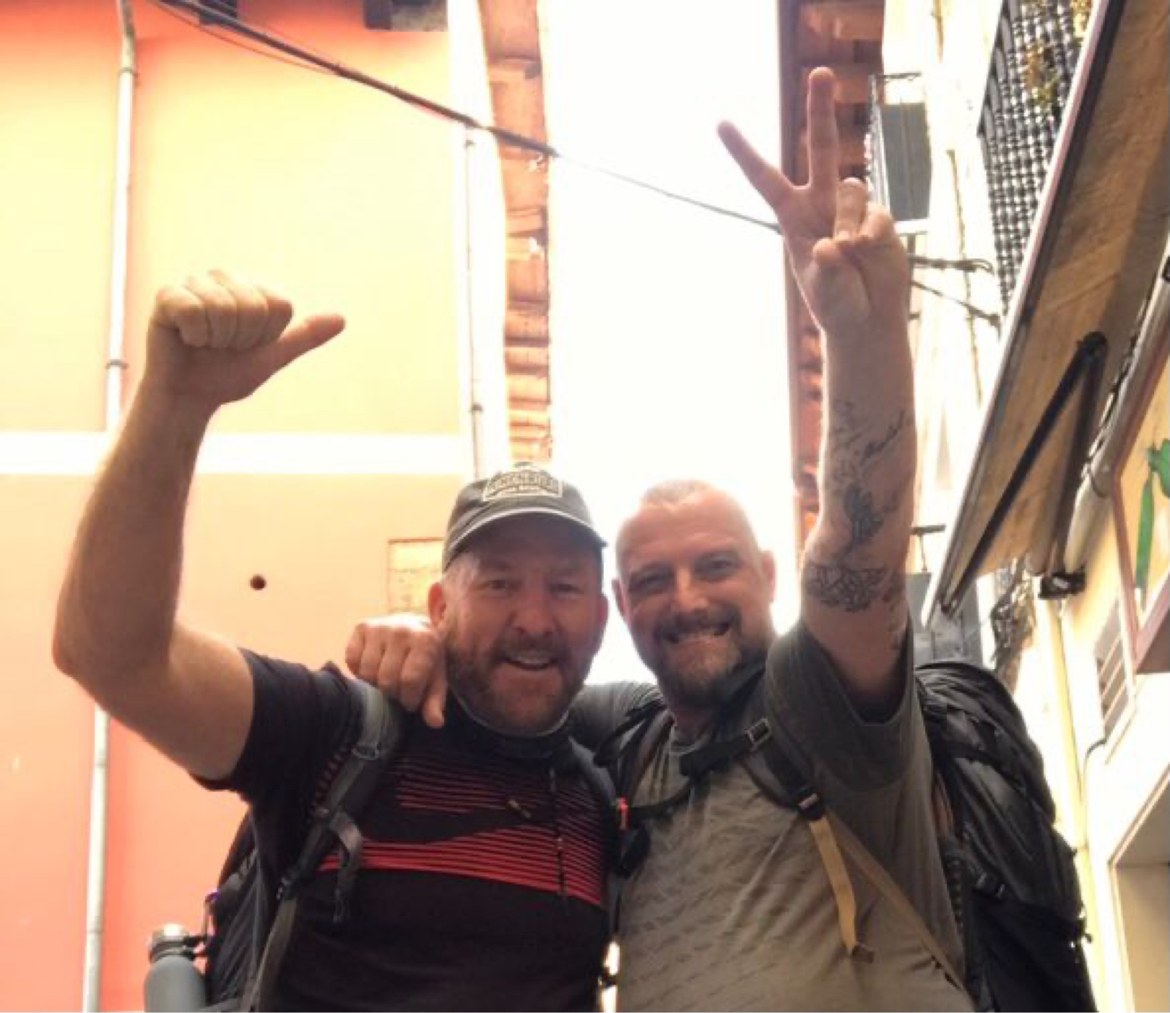 A pilgrim celebrating in a Spanish street