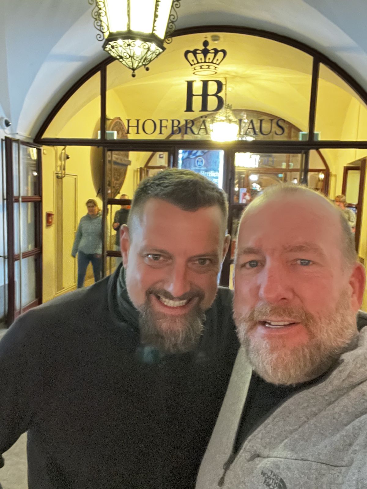 Mike and Nicki selfie under the HB Hofbrauhaus sign at night