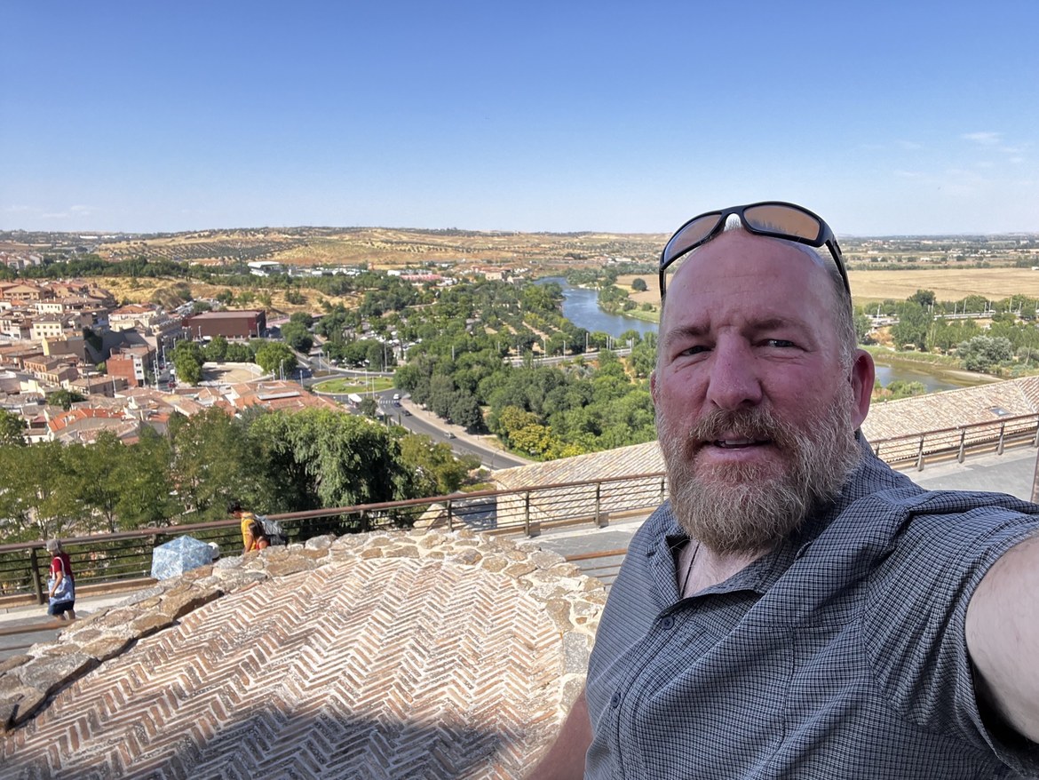 Mike selfie on a high terrace above Toledo, the Tagus river and the old town behind