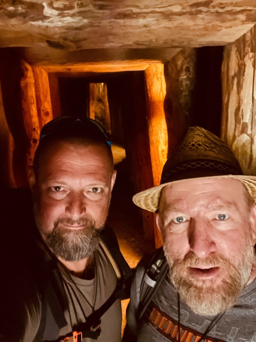 Nicki and Mike taking a selfie inside the timber-lined Knappa-Loch mine tunnel at the Arlberg